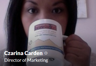 Czarina Carden, our Director of Marketing, enjoys her morning joe in an FSFP vision/mission/values mug.
